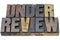 Under review in wood type