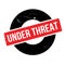 Under Threat rubber stamp