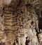 Underground cave with stalactites and stalagmites formed