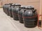 Underground plastic septic tanks for sale being displayed in a row