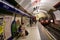 Underground train enters Piccadilly Circus