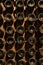 Underground wine cellar, bottles storage, bottles stacked on racks, bottle bottom