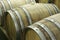 Underground wine cellar with rows of wooden barrels 6