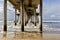 Underneath of the Huntington Beach Pier on stormy day