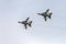 Underneath of Tornado military fighter airplanes pair  flying  at airshow, Linate, Italy