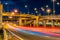 Underside of an elevated roads Expressway bridge and traffic at night