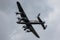 Underside of a Lancaster bomber with its landing gear out