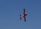 Underside of red Model Airplane Flying