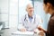 Understanding kind doctor talking to patient