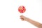 Understanding role sugar young diets. Hand of kid child holds colorful lollipop isolated white background. Children have