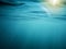 Underwater background with sunbeams