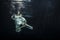 Underwater ballet dancers