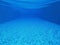 Underwater. Beautiful blue background of swimmingpool closeup