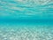 Underwater blue ocean background with sandy sea bottom