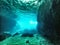 Underwater cave with lightfall