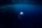 Underwater dark texture in ocean. Bubble in sea.