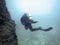 Underwater diver in underwater world