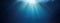 Underwater Dreamscape with Sunlight Penetrating the Depths. Tranquil and otherworldly undersea background. Panorama with