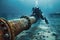 Underwater Exploration: Diver by Submerged Pipeline