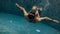 Underwater. Father and daughter swimming in the pool on father`s day.