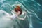 Underwater girl. Beautiful red-haired woman in a white dress, swimming under water.