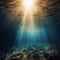 An underwater ocean illustration showing amber golden sun rays shining through the water surface on the green blue sea bed below.