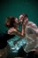Underwater Photoshoot of a Couple in Love. Man and Woman