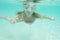 Underwater portrait of girl, snorkelling in mask