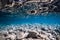 Underwater view with stones bottom, reflection and crystal water