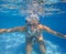 Underwater woman in swimming pool