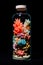 Underwater Wonders: Corals and Fish Captured in a Bottle Against a Black Background. created with Generative AI