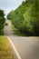 Undulating road on a hillside in a wooded area of San Luis, Argentina.