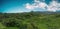 Unedited photo, view of aceh forest, known as the lungs of the world, against a blue sky background, Aceh-Indonesia