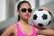 Unemotional Filipina Person With Soccer Ball