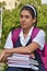 Unemotional Girl Student Wearing School Uniform With Notebooks