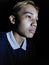Unemotional Young Philippine Male Man In Dark