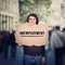 Unemployment as global issue. Unemployed man activist holding a cardboard banner, participating in a street demonstration protest