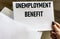 UNEMPLOYMENT BENEFIT words written in letter from envelope