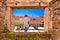 UNESCO Town of Trogir main square viewthrough stone window