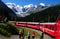 The Unesco world heritage Bernina train curving through the upper Engadin at Morteratsch glacier