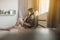 Unexpected pregnancy concept,Asian woman sitting on bedroom at home,Female feeling unhappy and confused problem in personal life