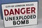 Unexploded bomb sign