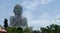 Unfinished construction of Buddha with sky