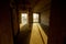 Unfinished empty flat, two huge plastic windows, walls made of aerated concrete blocks, cement screed on the floor