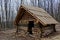 Unfinished historical medieval wooden clapboard cabin in Bojna, Slovakia