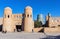 Unfinished Kalta Minor Minaret and twin-turreted Gate - Khiva, Uzbekistan