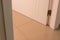 Unfocused abstract open door and covered tile floor white pastel interior modern environment with empty copy space for text or