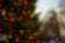Unfocused bokeh festive Christmas light outdoor silhouette on the street