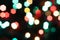 Unfocused multicolored bright geometric forms traditional christmas lights