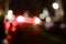 Unfocused night scene with lights from cars and street lights